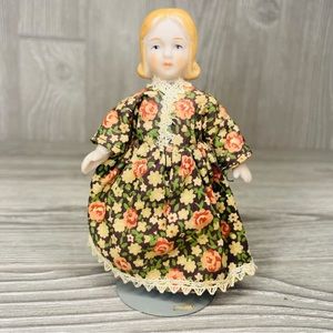 Vintage Small ceramic string jointed doll collectible